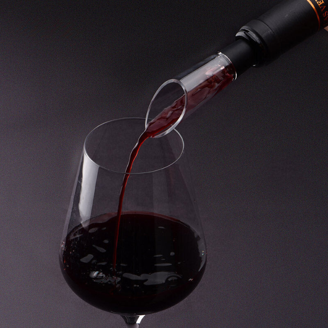 Wine pouring smoothly from a bottle using the included aerator spout