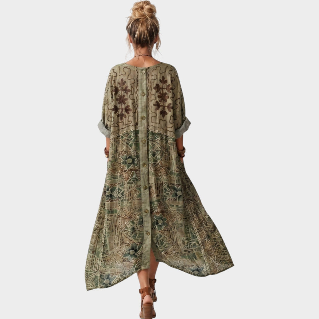 Back view of a woman walking in a green boho button-front maxi dress