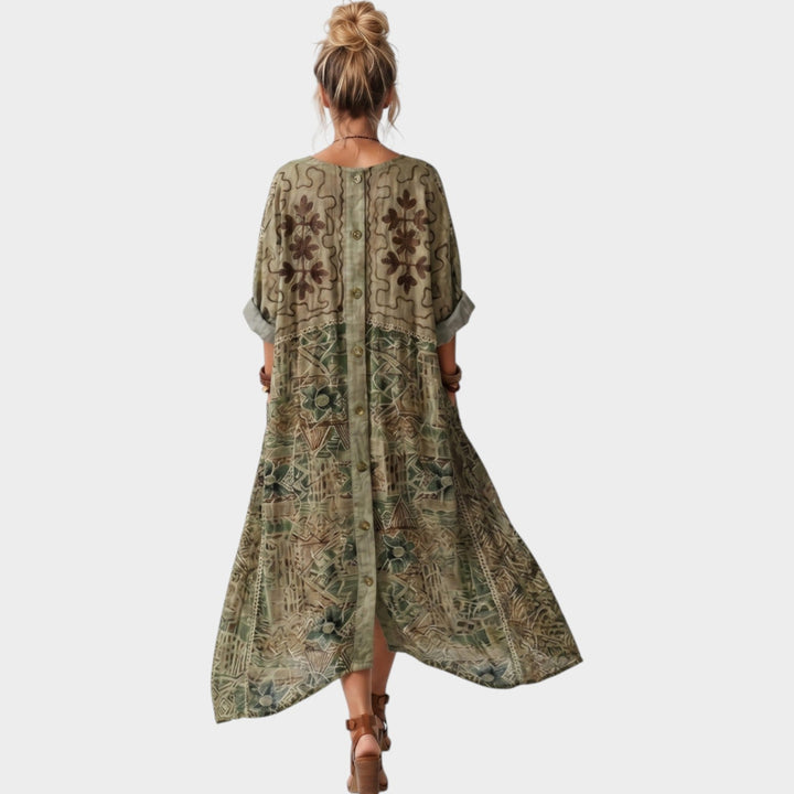 Back view of a woman walking in a green boho button-front maxi dress