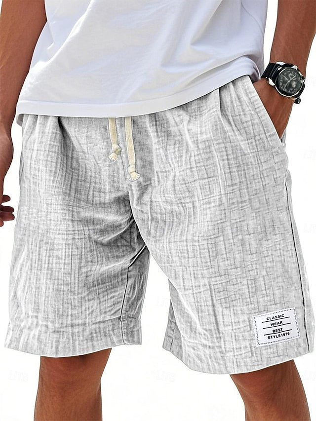 Mens casual knee-length shorts with elastic waist in solid color