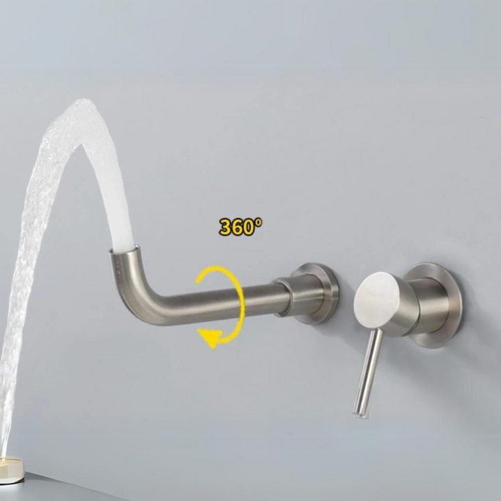 Wall-mounted basin mixer tap showing 360-degree rotation feature
