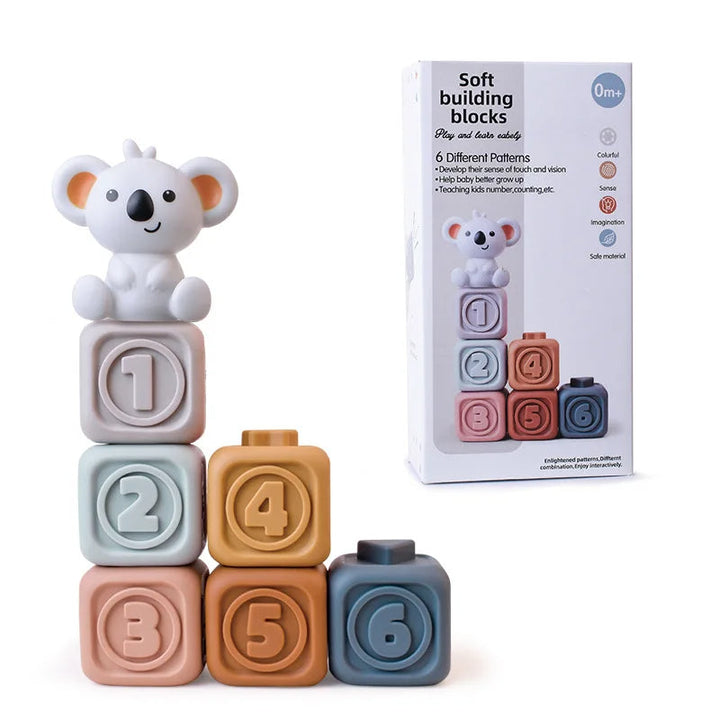 Infant sensory toy with textured rings for tactile exploration