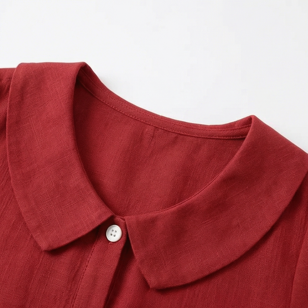 Detail of button-up closure on comfortable women's fashion blouse