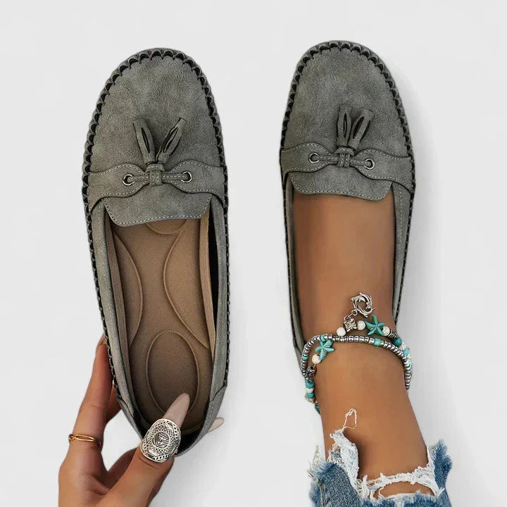 Grey women's slip-on loafers with bow detail