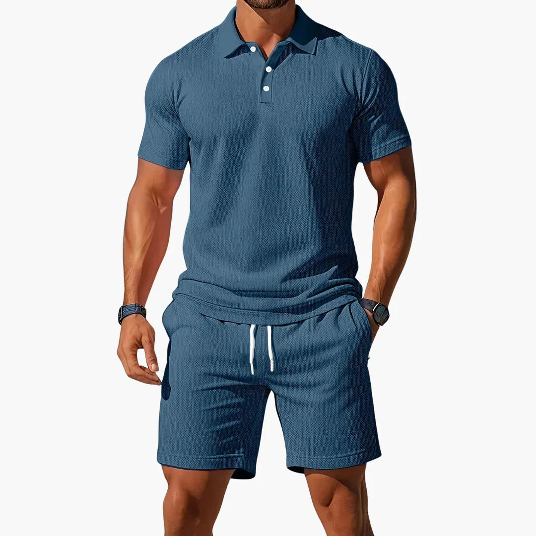 Flat lay of the complete mens summer polo shirt and shorts