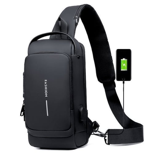 Top-down view of the main zipper closure on the black travel sling bag.