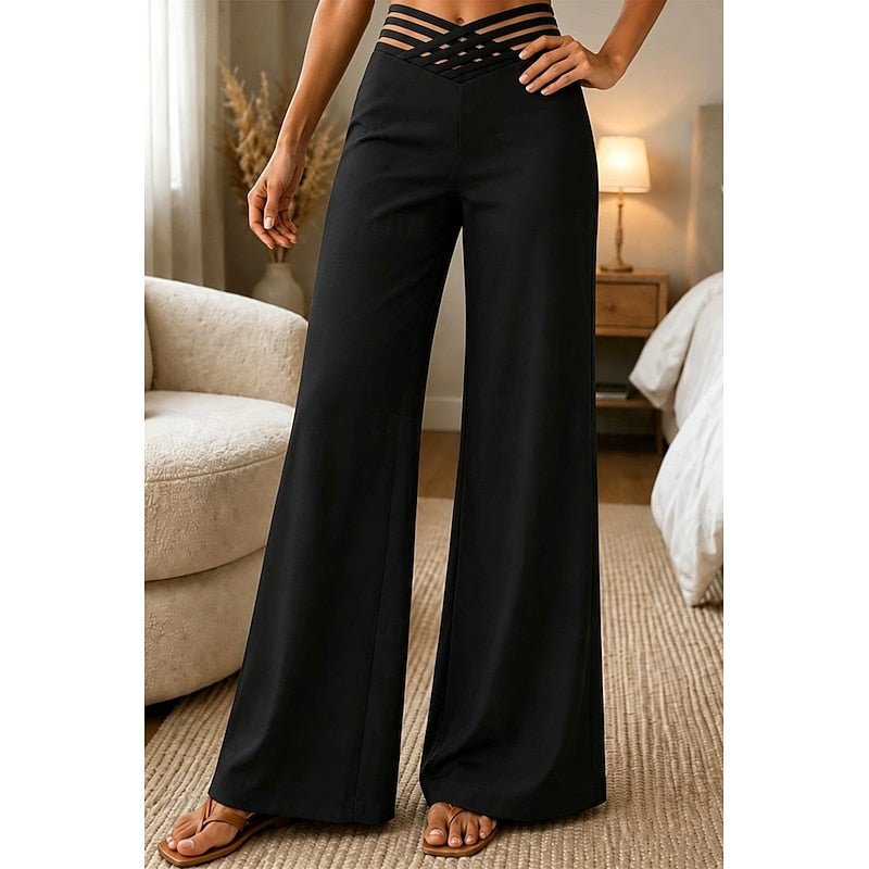 Model wearing Black high-waist wide-leg trousers