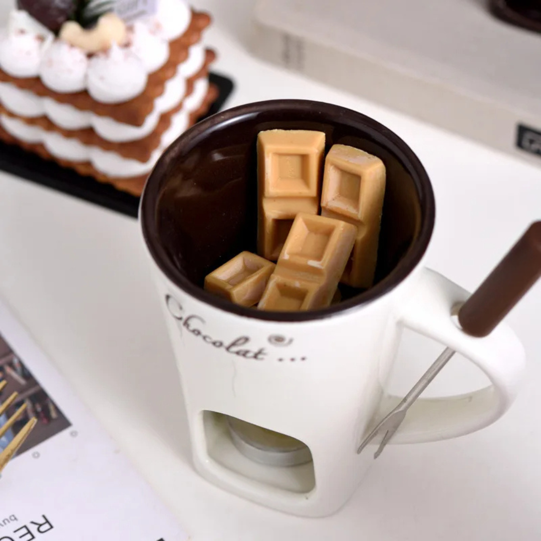 Ceramic chocolate and cheese melting fondue bowl close-up