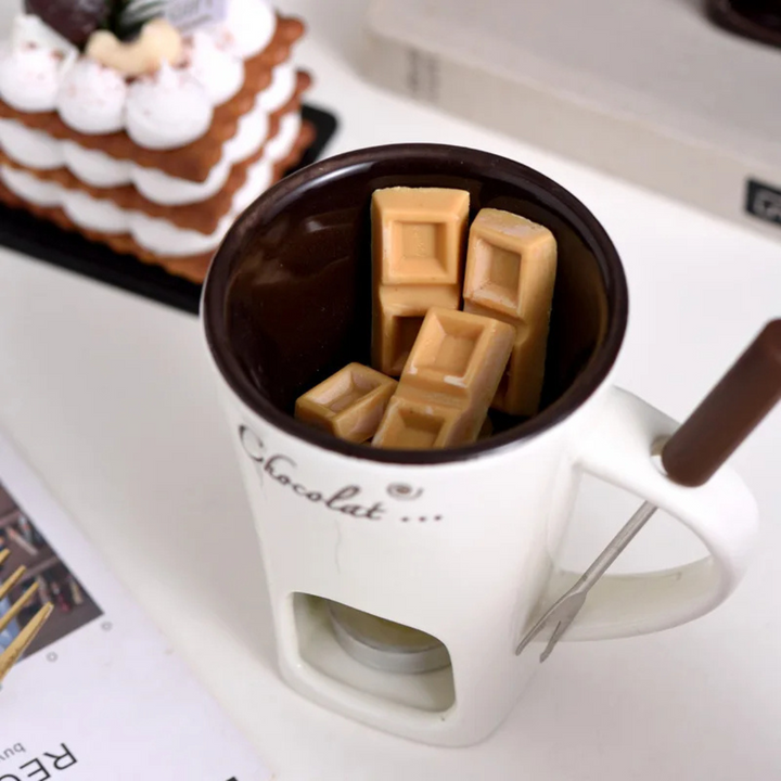 Ceramic chocolate and cheese melting fondue bowl close-up