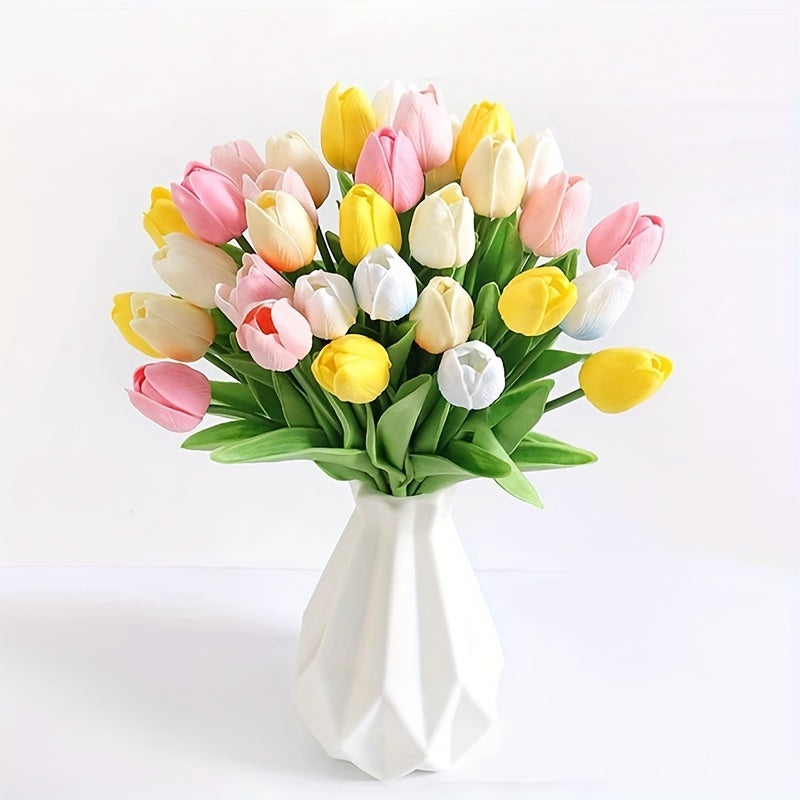 A vibrant bouquet of multicolored artificial tulips arranged inside a modern white ceramic vase.