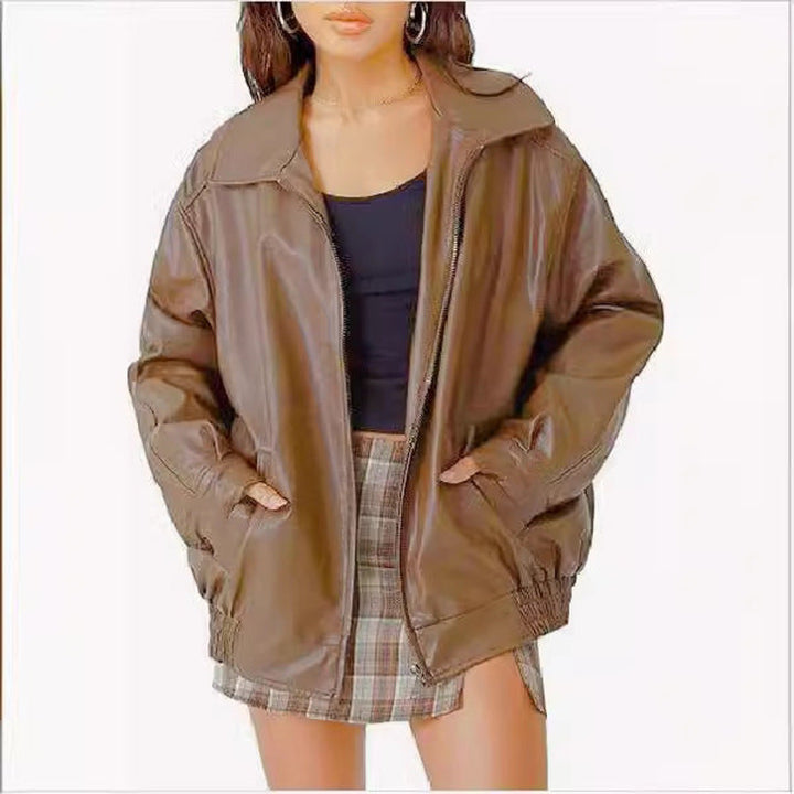 Oversized jacket zipper and pocket detail on womens leather bomber