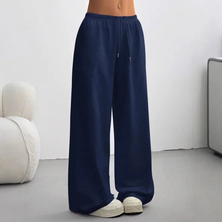Women's Madeline casual wide-leg joggers in black, showing flowy fit and elastic waist.