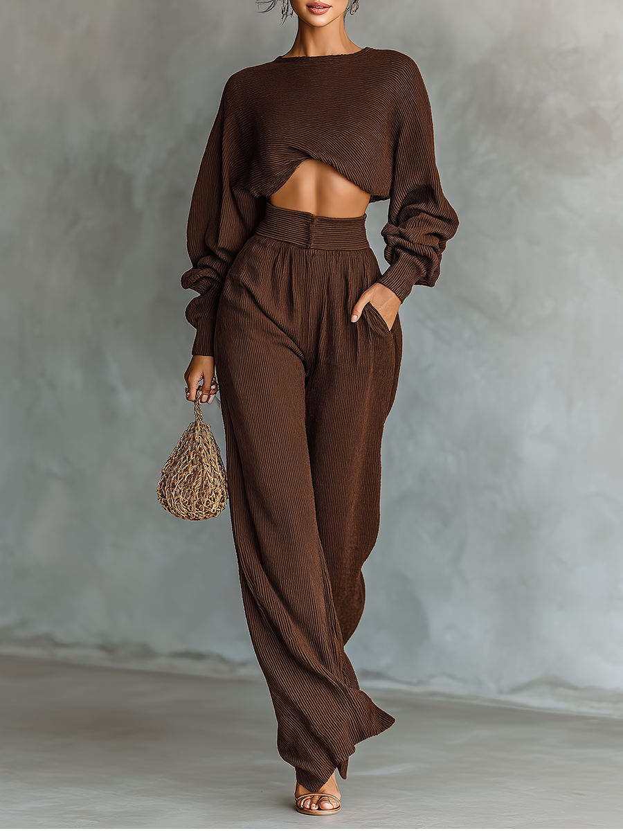 Close-up of the textured coffee brown knit fabric on the matching two-piece pants set.