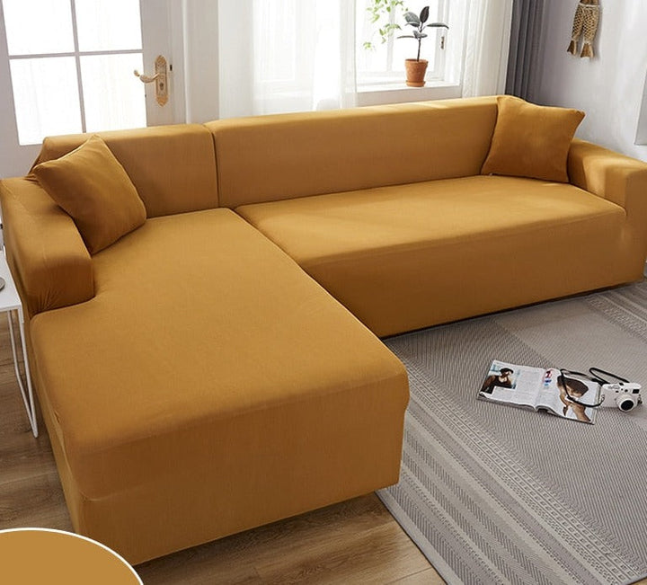 Detailed view of anti-slip tuck-in rollers securing the stretch couch cover