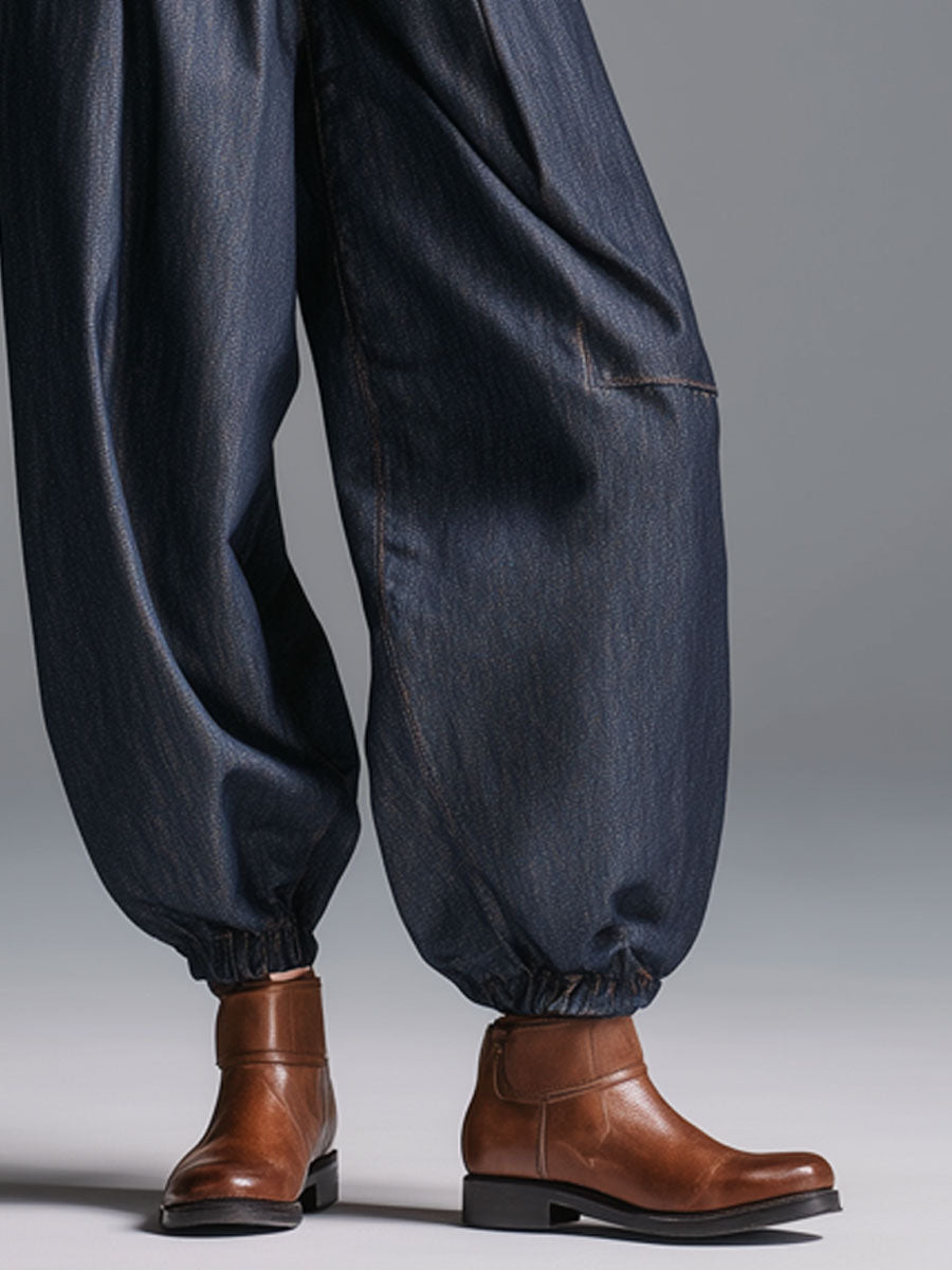 Back view of women's retro navy blue lantern jeans showing baggy fit and pocket detail