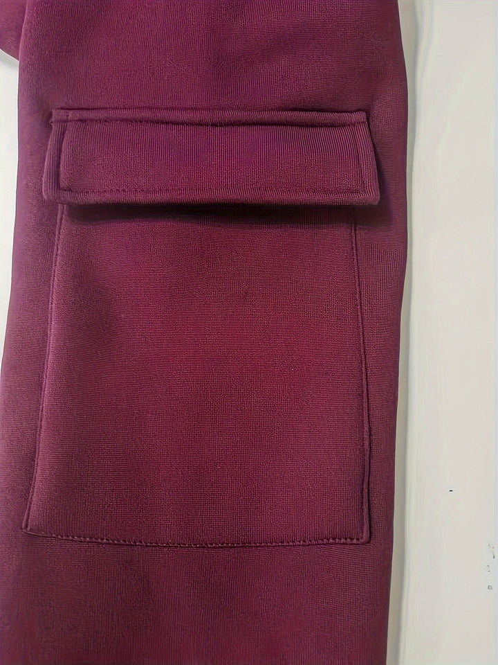 Close-up of fabric weave highlighting durability of men's outerwear.