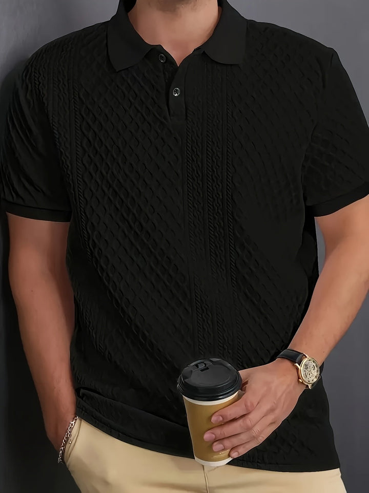 Close-up view of the black textured polo shirt collar and placket