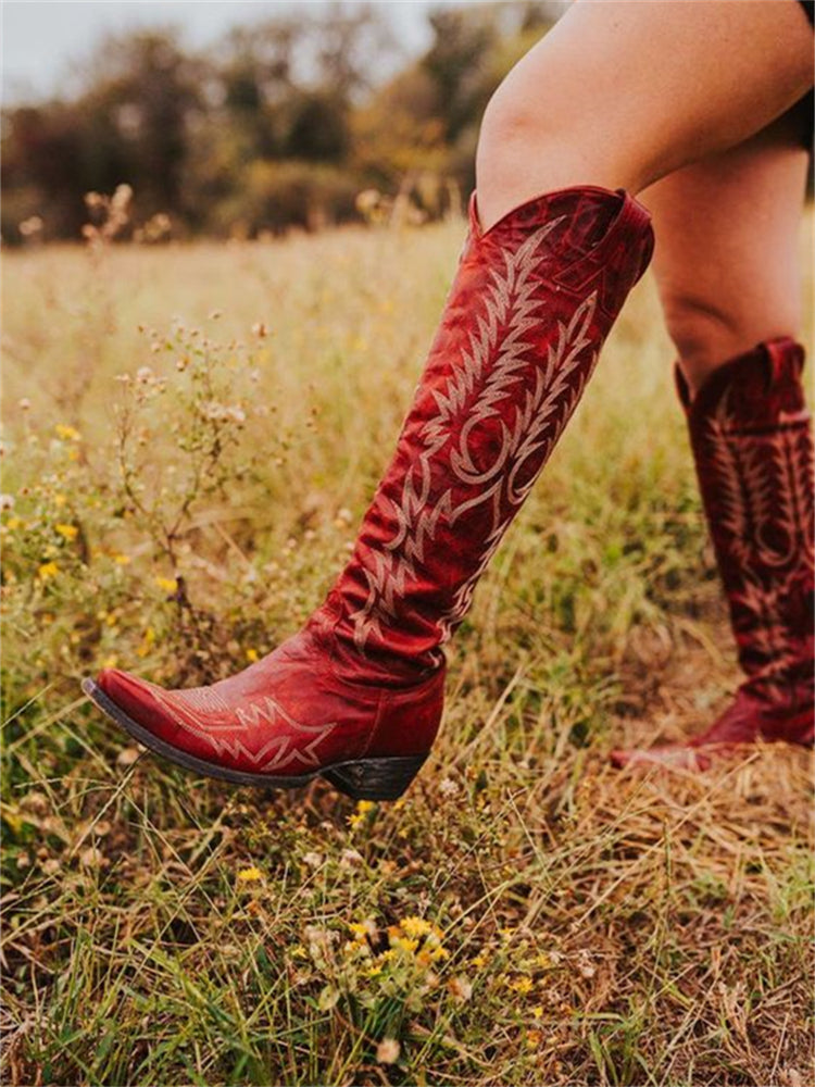 Textured sole and stacked heel of stylish women's knee-high embroidered cowboy boots