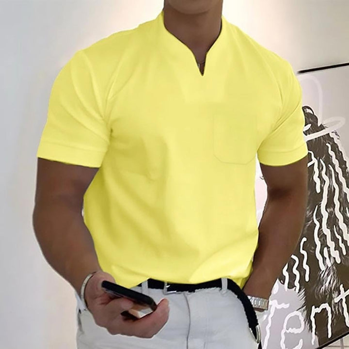 Man wearing a yellow classic polo shirt