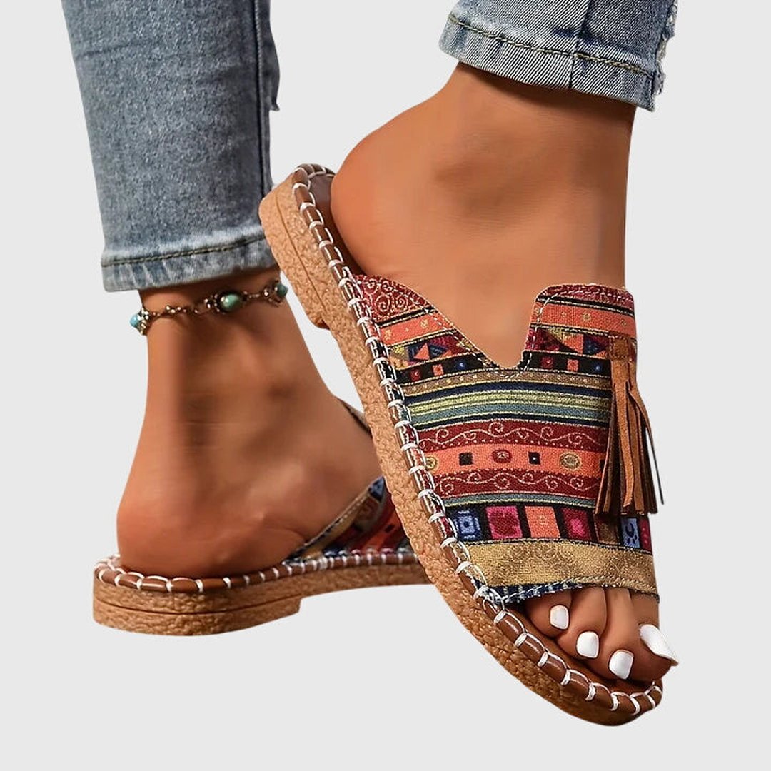 Flexible strap detail on lightweight orthopedic comfort footwear