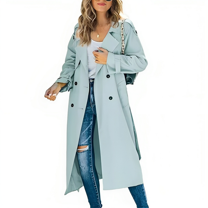 Women's elegant double-breasted trench coat in classic beige, back view showcasing tailored fit and vent.