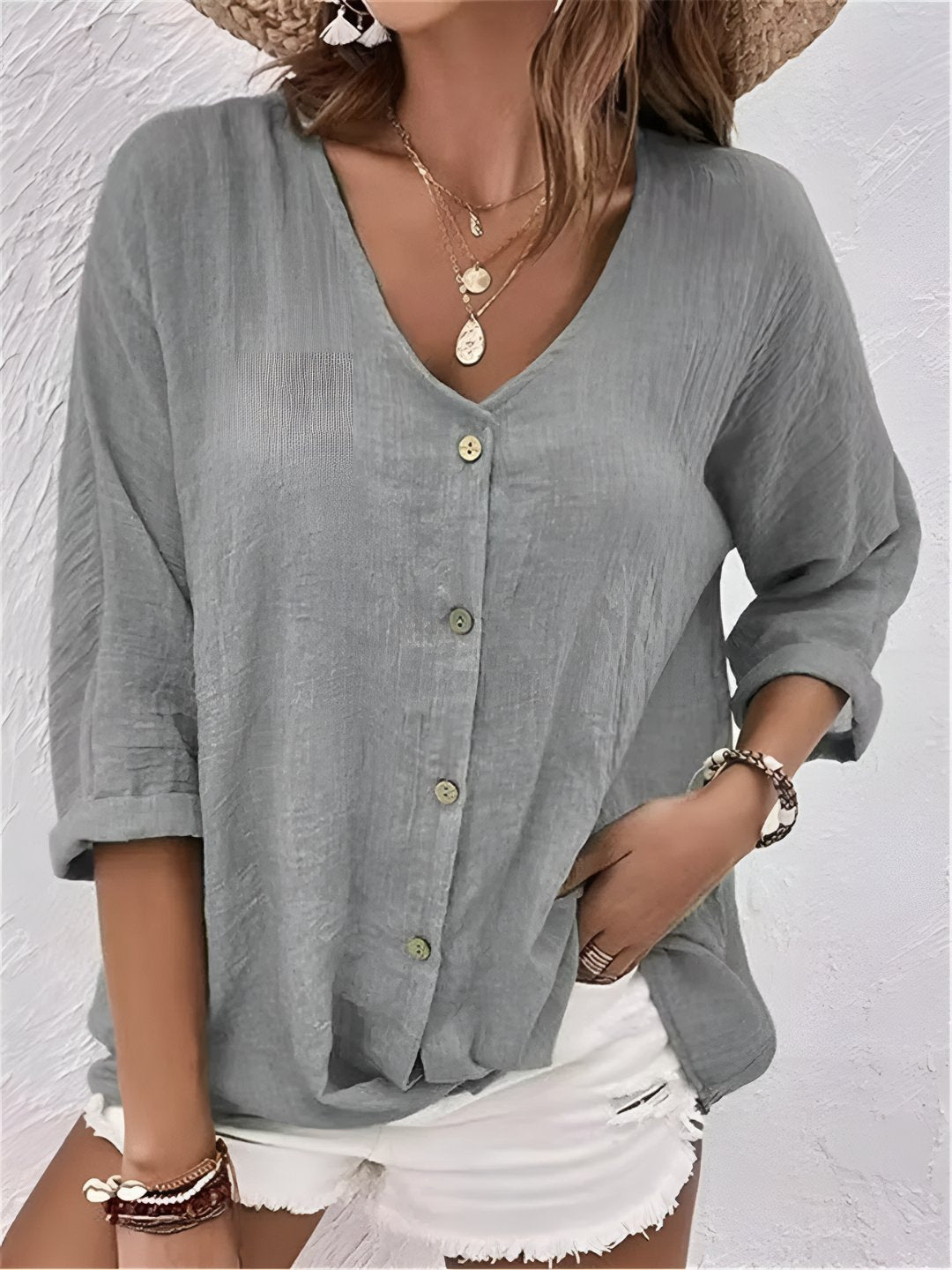 Detailed shot of V-neck collar on casual womens blouse