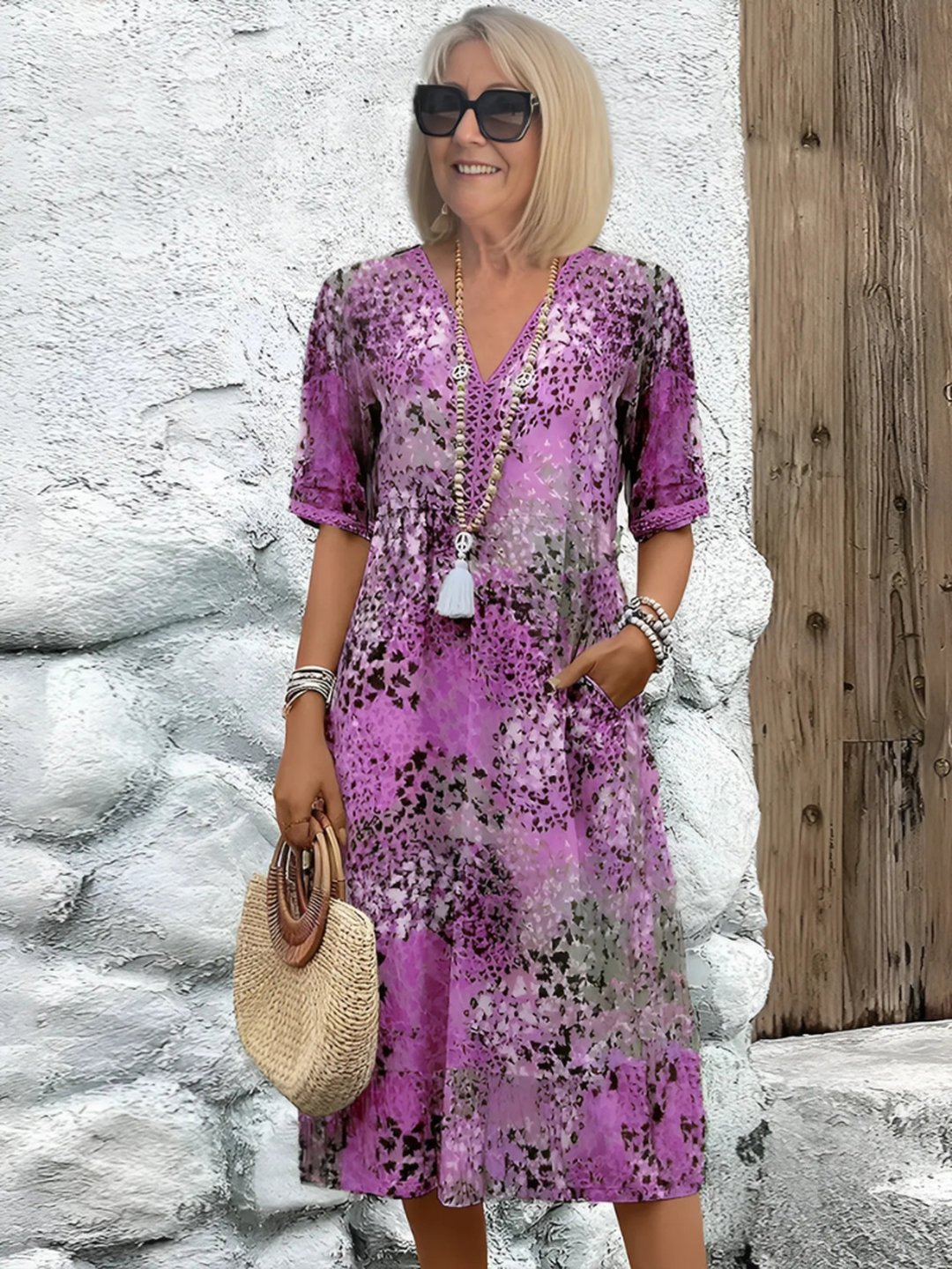 Close up fabric texture of vibrant women mid length dress showing quality summer dress material