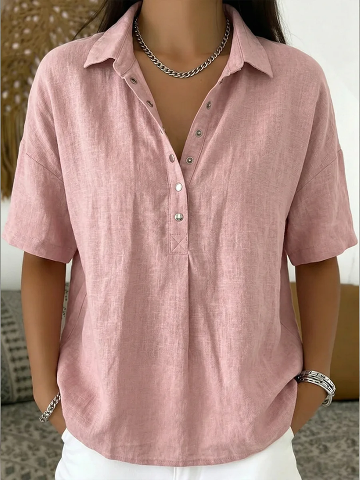 Women's casual button-up collared shirt in short sleeve style