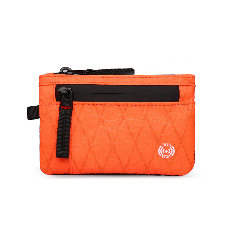 Front view of the bright orange compact zippered card wallet with black zipper pull