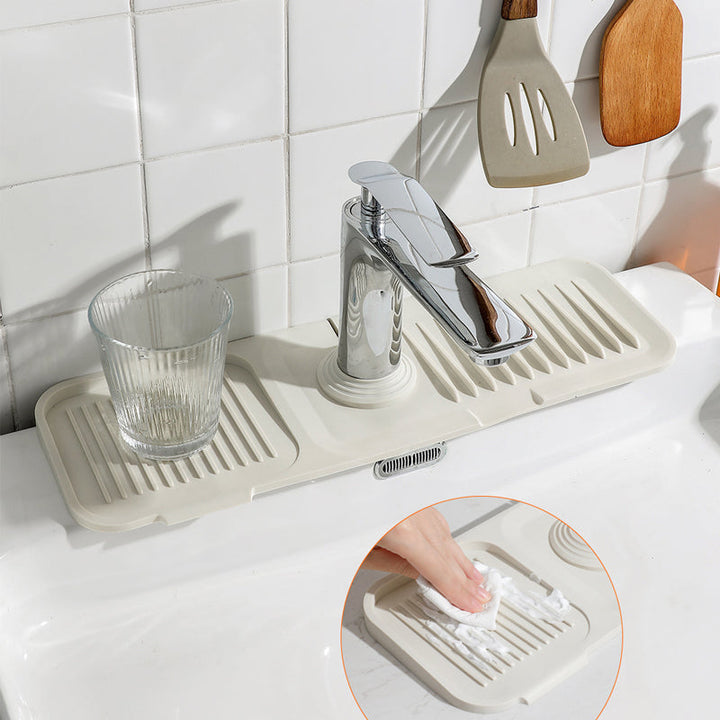 Heat resistant silicone mat used as a hot pan trivet in kitchen