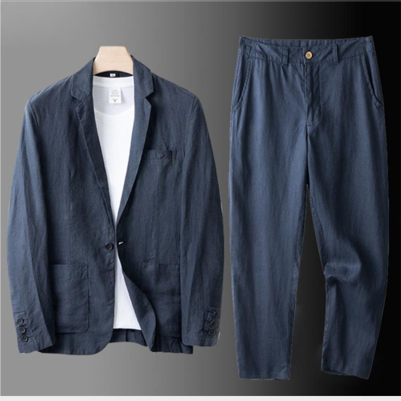 Tailored men's blazer paired with matching wide-leg trousers