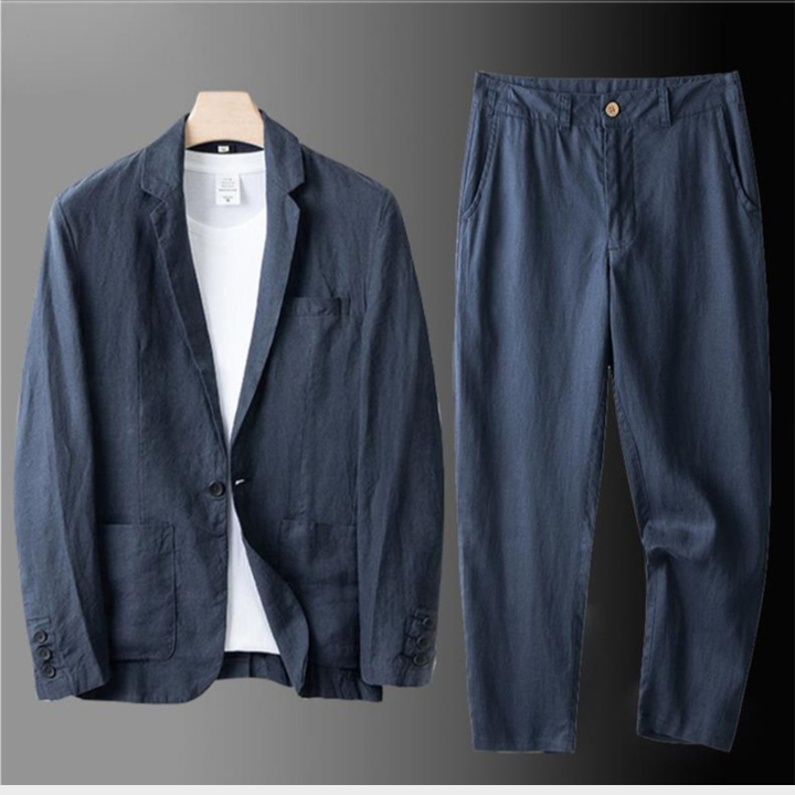 Tailored men's blazer paired with matching wide-leg trousers