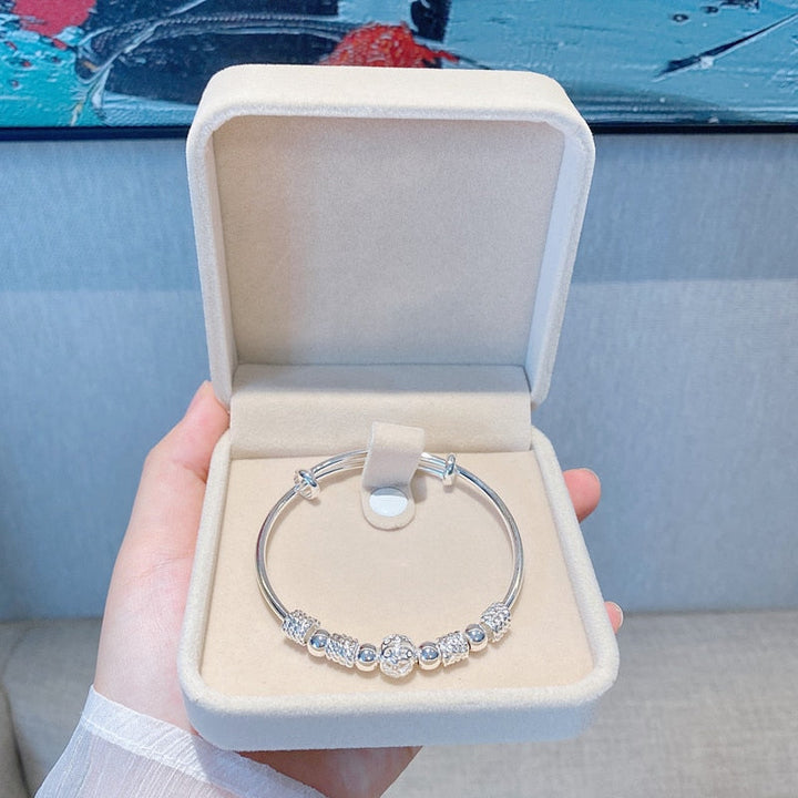Gift for her: women's sterling silver adjustable charm bracelet