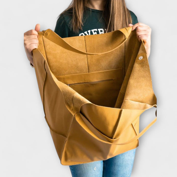 Everyday bag worn over the shoulder as a stylish and functional tote bag.
