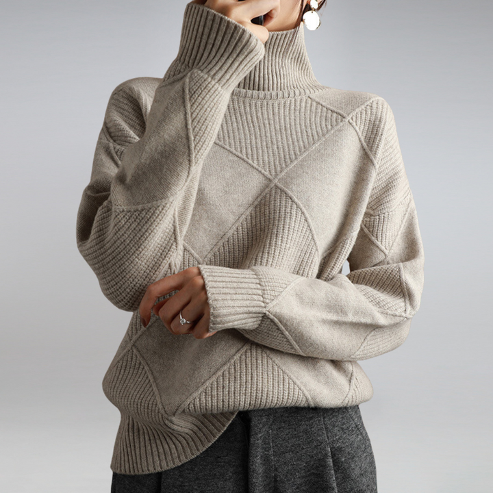 Close-up of ribbed turtleneck collar on a cozy women's winter pullover sweater.