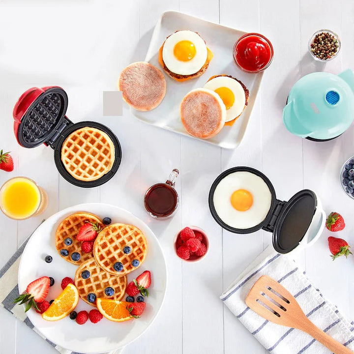 Lightweight snack maker displayed next to a plate of fresh hot waffles