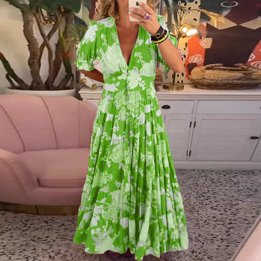 Model wearing a fresh green floral maxi dress with short sleeves