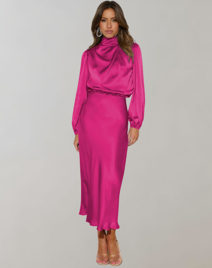 Model wearing pink long sleeved satin dress