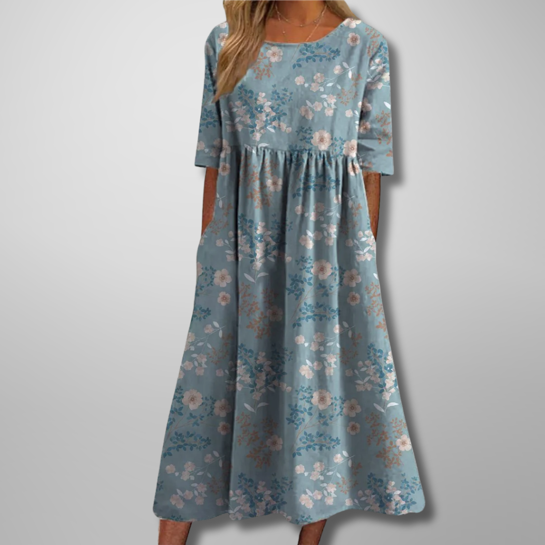 Casual loose-fit summer dress with vibrant floral pattern and midi length