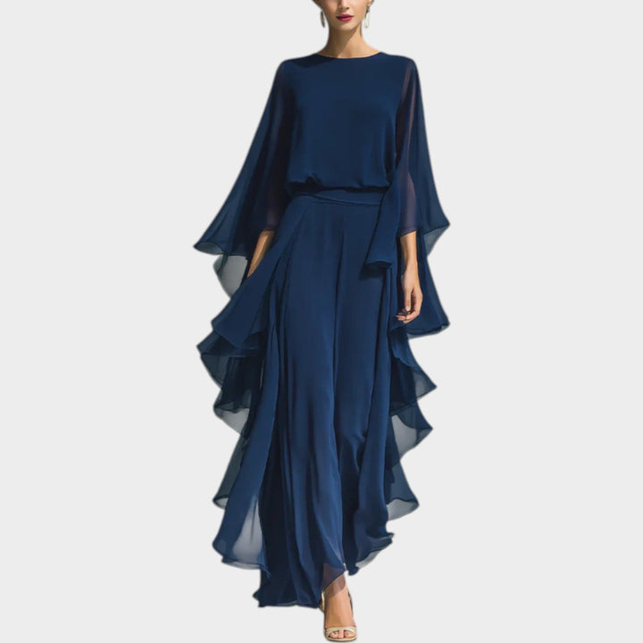 Front view of women's elegant navy blue ruffled matching set