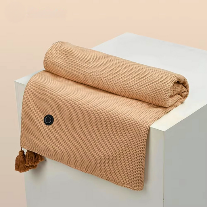 Soft grey usb heated shawl draped over shoulders for portable winter comfort and warmth