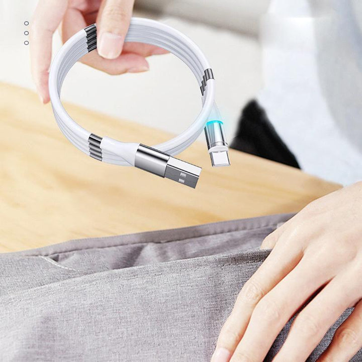 Coiled universal charger cable demonstrating easy storage and organization