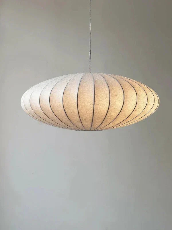 Luxury crystal chandelier accents glowing softly on the modern ceiling lamp