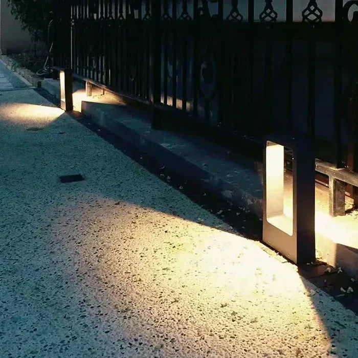Close-up of waterproof LED garden light fixture showing durable metal construction