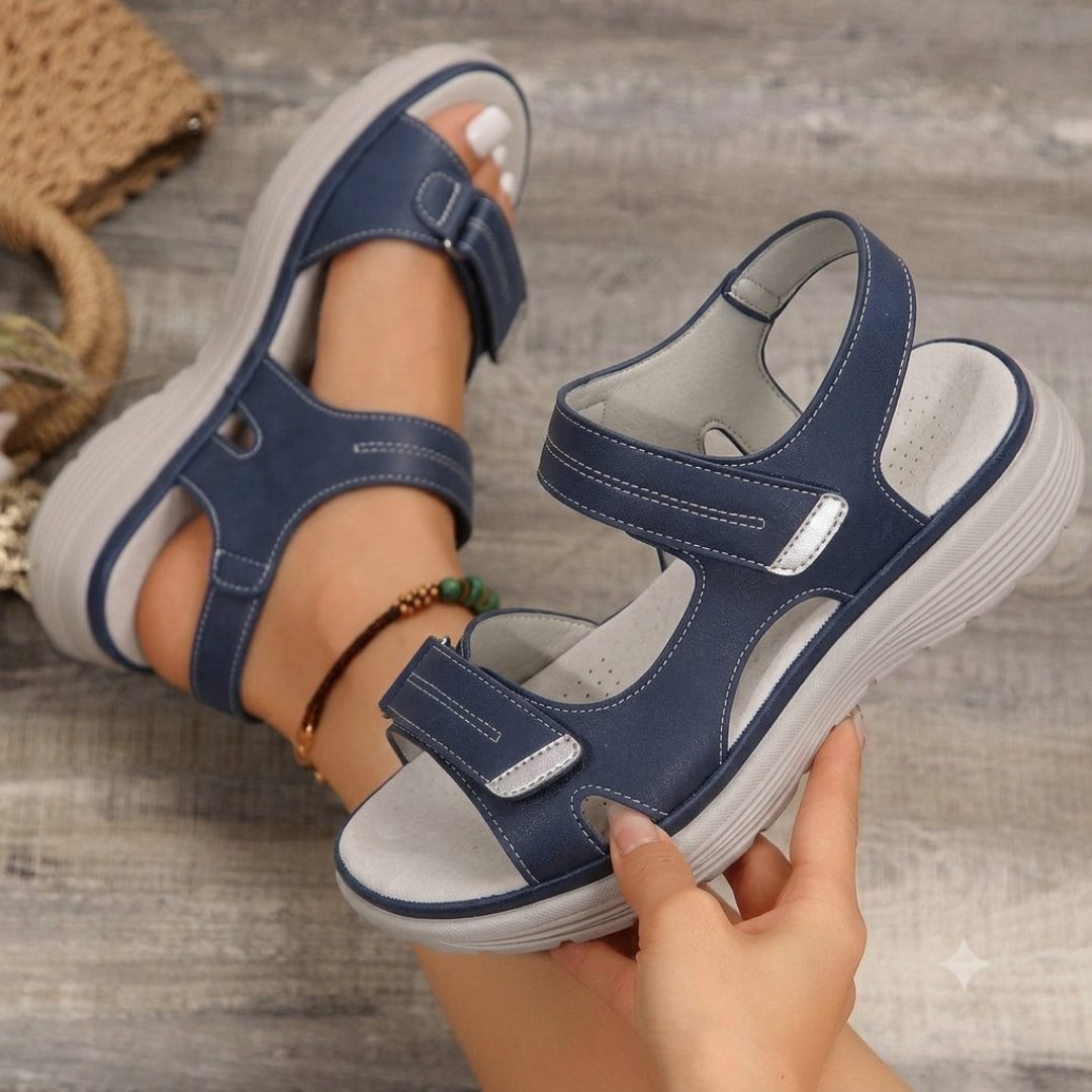 Side view of comfortable women's walking sandals with secure hook and loop adjustable straps