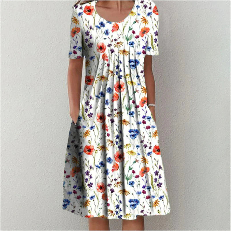 Womens stylish floral print dress showcasing a flattering midi cut and short sleeves.