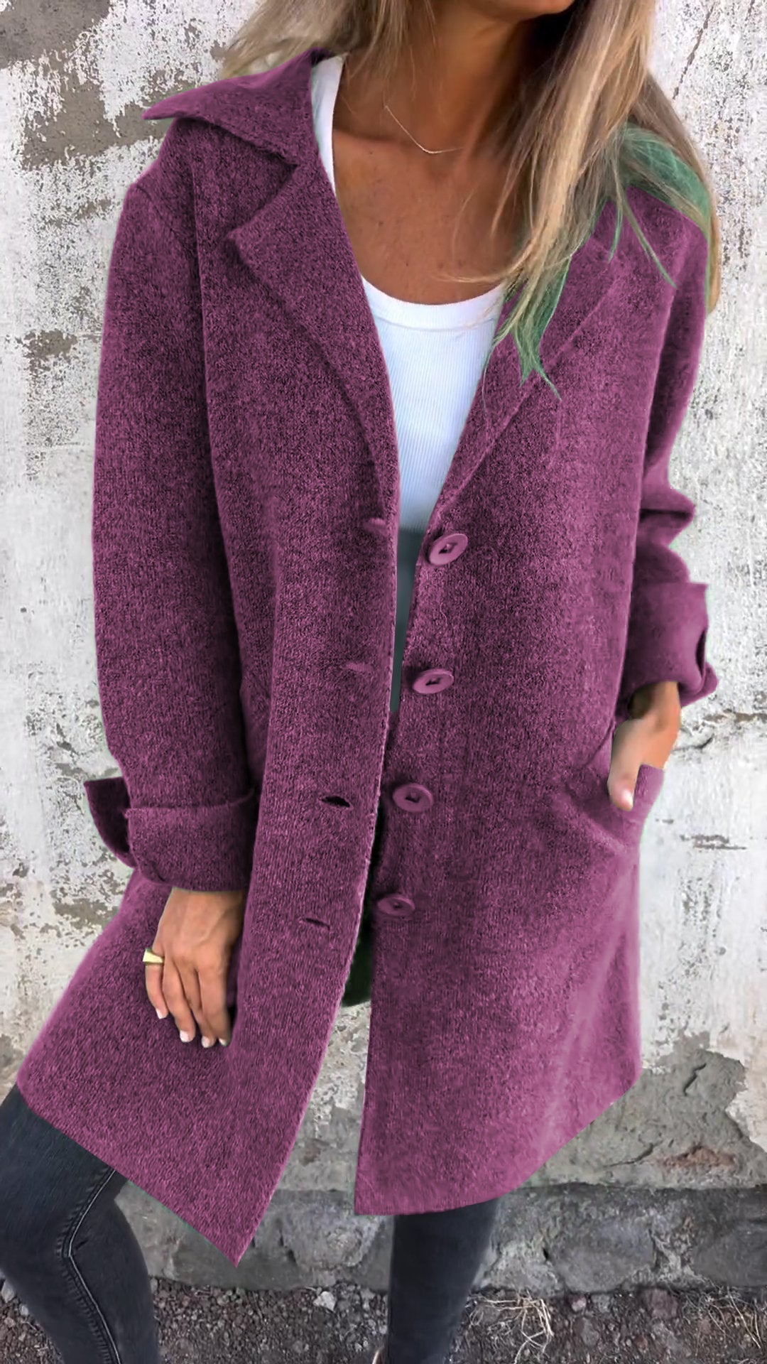Close up of button down closure on the casual knit jacket