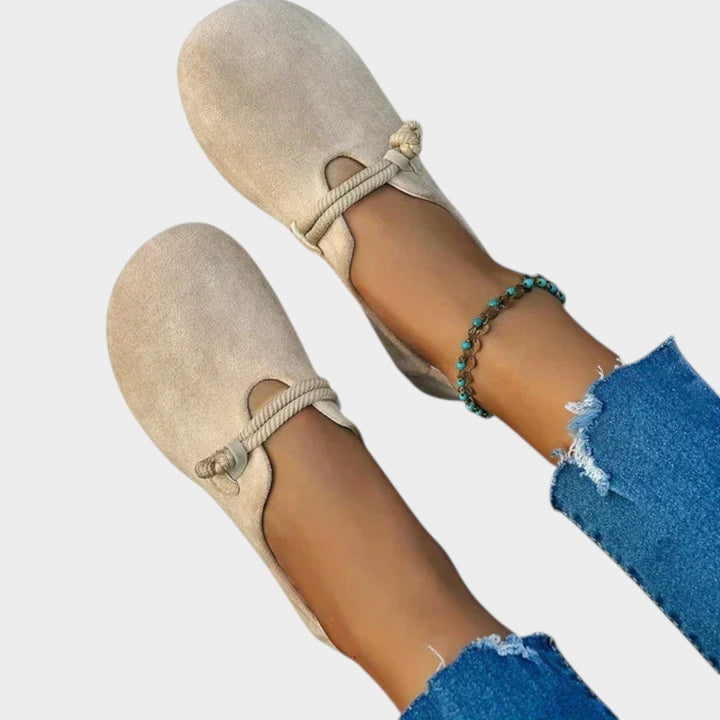 Angle view of beige casual slip-on flat shoes