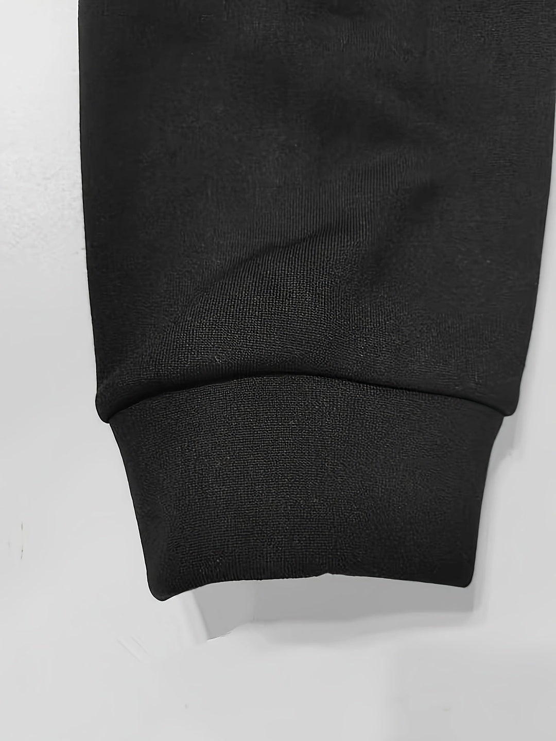 Back view of men's casual outerwear hoodie showing clean lines and tailoring.