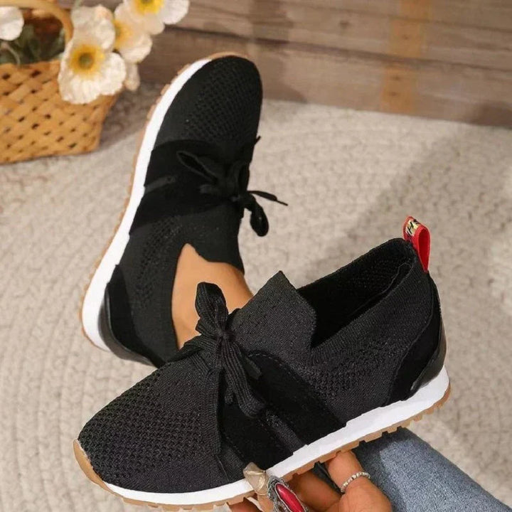 Side profile of women's orthopedic comfort heeled shoes showing supportive arch design